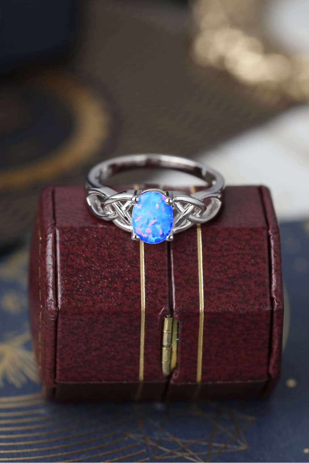 Crisscross 4-Prong Opal Ring Sky Blue e24f1ca81e20445a9037c8c44e8a17f9-Max Trendsi