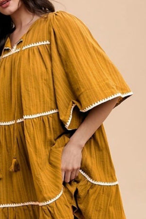 Annie Wear Tassel Contrast Trim Tie Neck Half Sleeve Tiered Dress 1338131c-1803-46d3-8c81-2a306c3c54ae-Max Trendsi