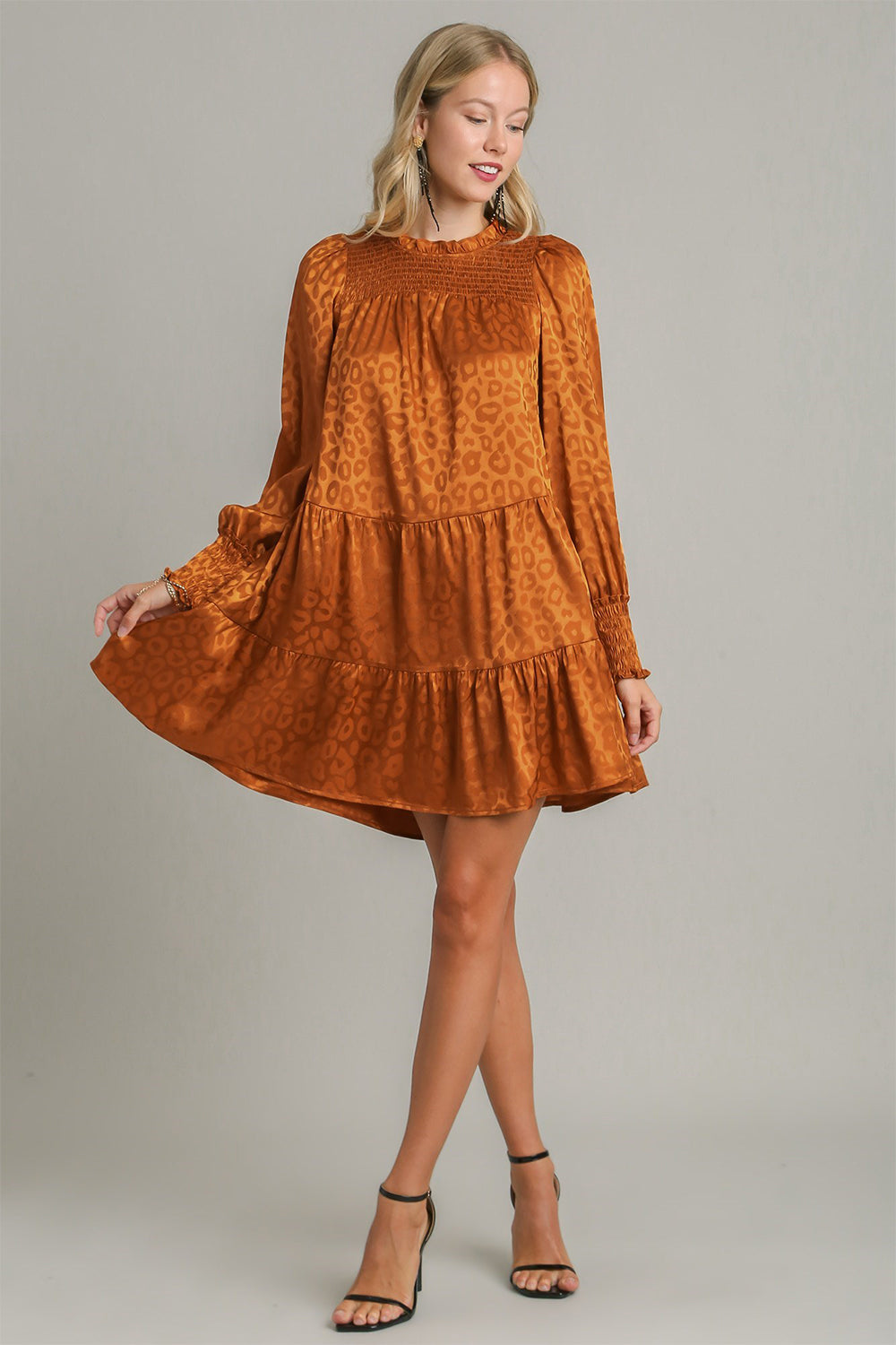 Umgee Smocked Leopard Long Sleeve Tiered Dress 1dee4b15-952e-4f3c-ae3b-80e776d57a1d-Max Trendsi
