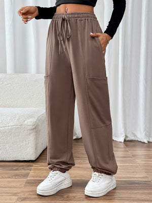 Perfee Tied Joggers with Pockets 3eb51289-a4e0-4391-a85c-e0c83de75fa5-Max Trendsi