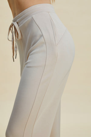 Basic Bae Full Size Air Scuba Drawstring High Waist Cropped Pants 40a71d22-1e29-4979-9f27-ad8cd4d32041-Max Trendsi