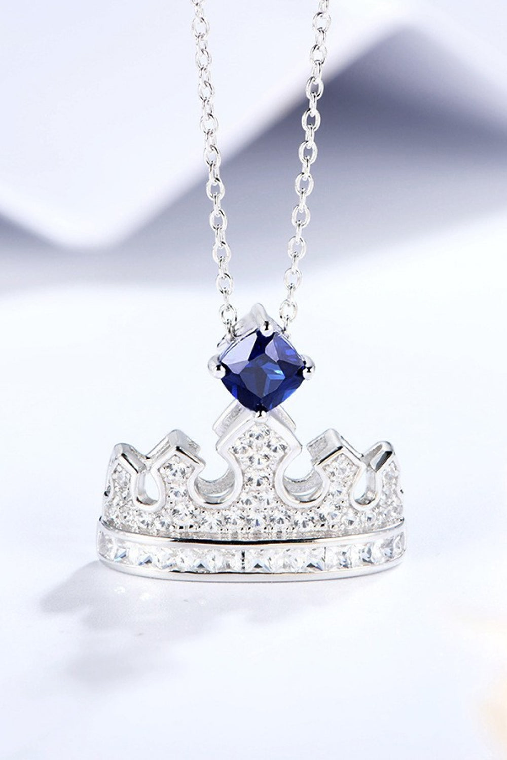 Zircon Lab-Grown Sapphire Crown Shape Pendant Necklace 6c0dd5a75baa42cea268c228fff8b63c-Max Trendsi