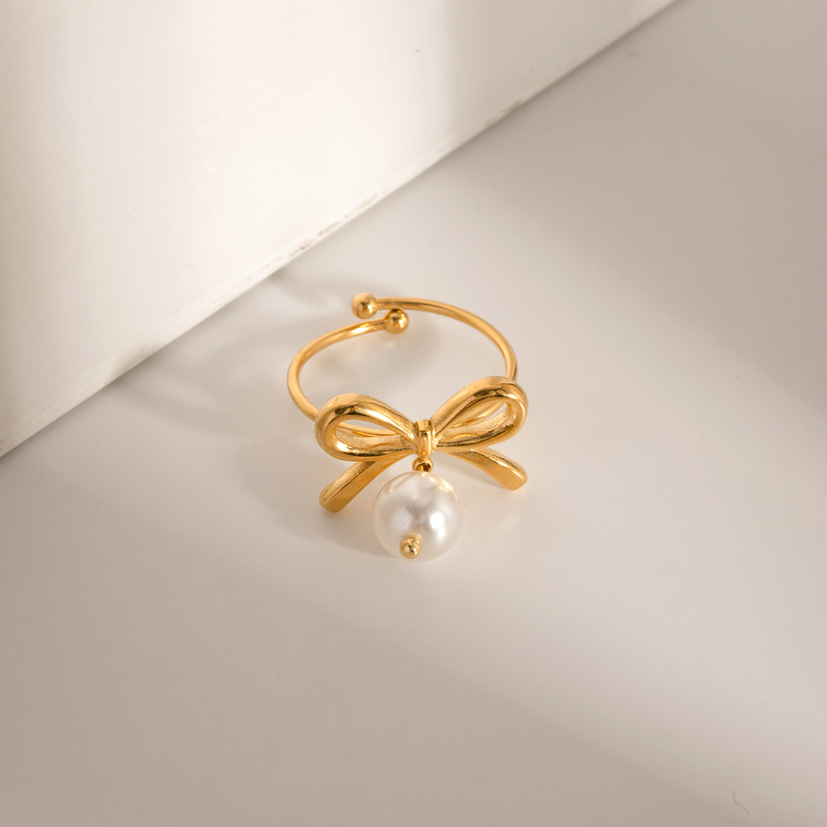 Stainless Steel Pearl Bow Ring cd96e968-7d5e-45e7-9a25-a75905e66e0a-Max Trendsi