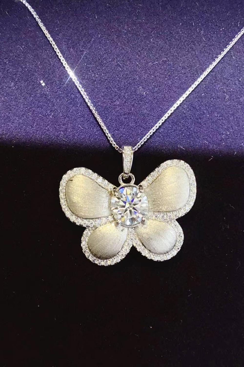 1 Carat Moissanite Butterfly Pendant Necklace ef8a29f3934349bc95fc114a4073fccd-Max Trendsi