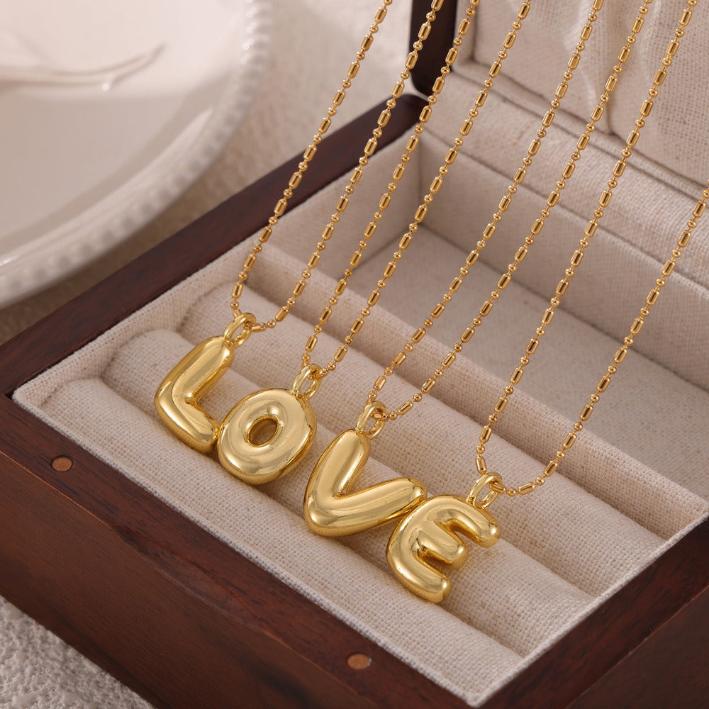 18K gold simple and elegant 26 letters design light luxury style necklace fd070ba5-3db8-47a6-94ac-d9ecab70123a Artshiney